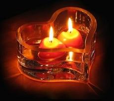 Heart shaped candle with twin flames